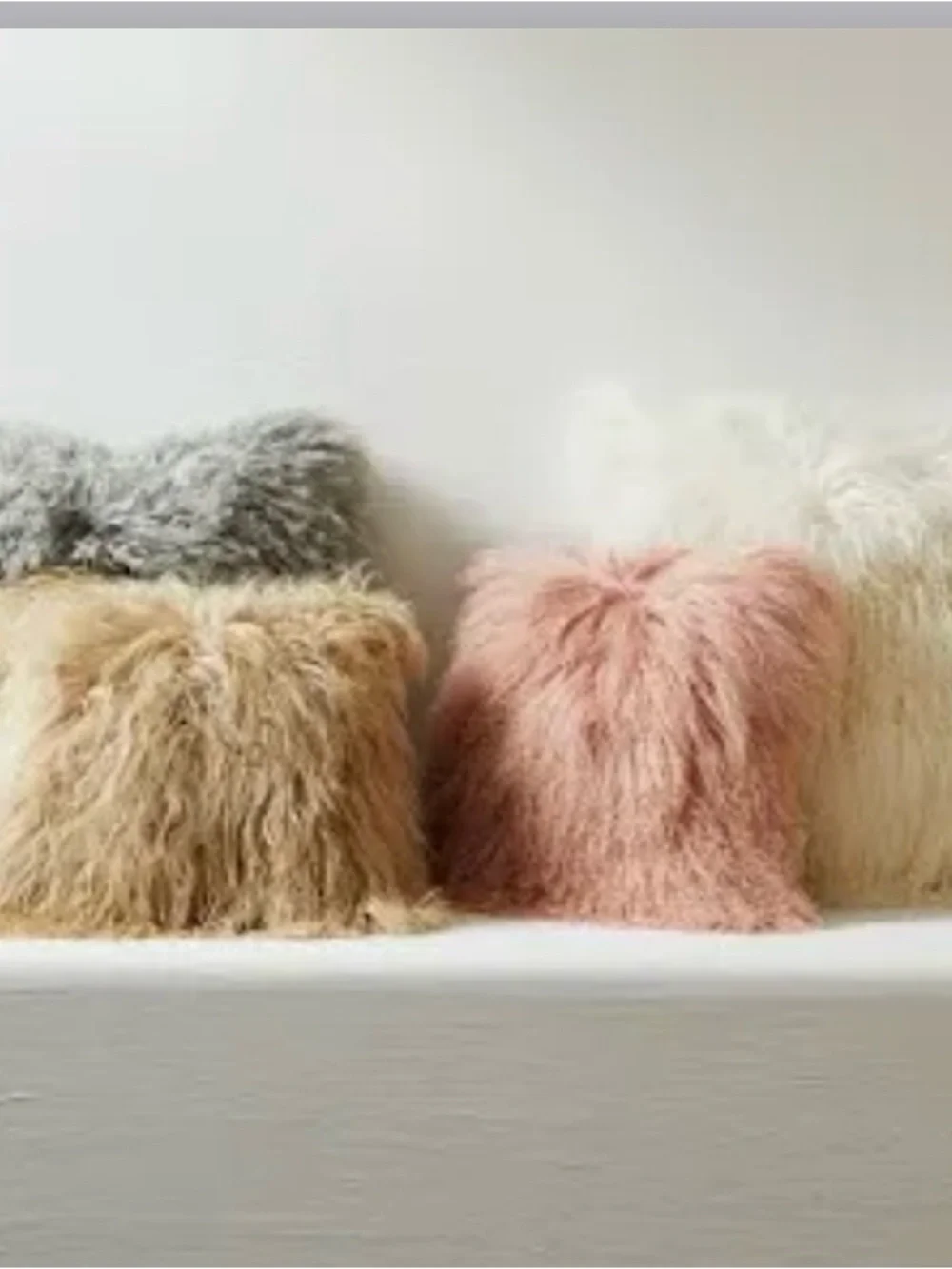West Elm Mongolian Lamb pillow cover sand